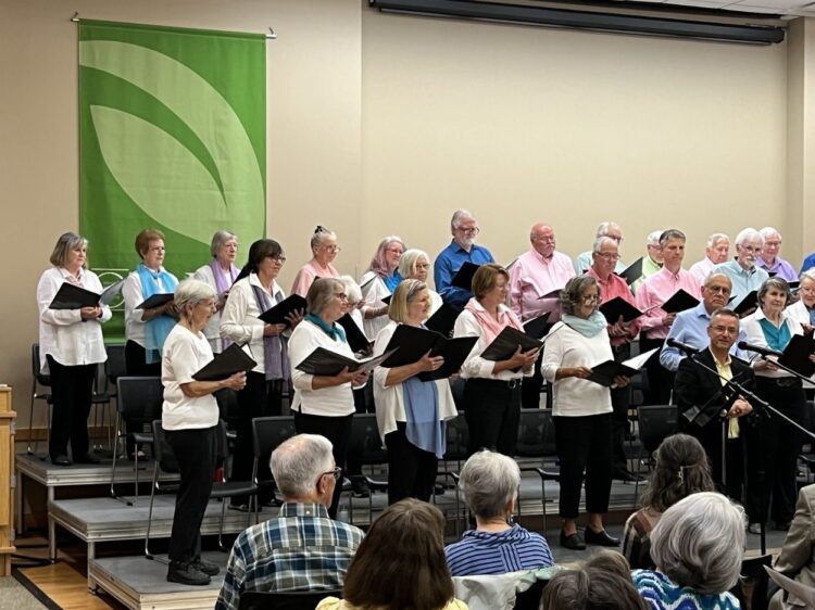 The Asheville Senior Chorus performs during The Songs That Make The Whole World Sing concert