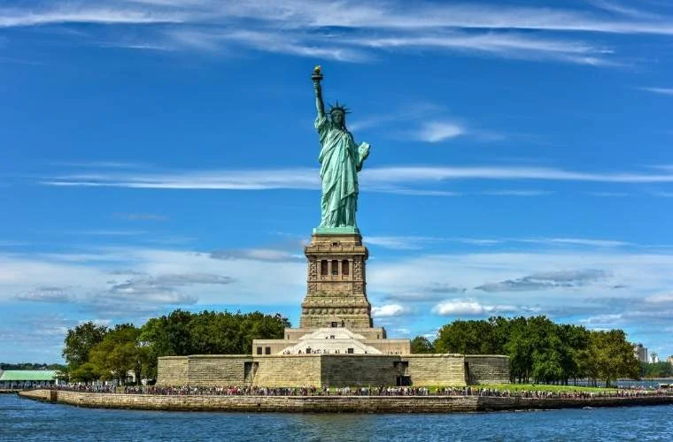 The Statue of Liberty, whose pedestal Emma Lazarus helped fund with her 1883 sonnet "The New Colossus."
